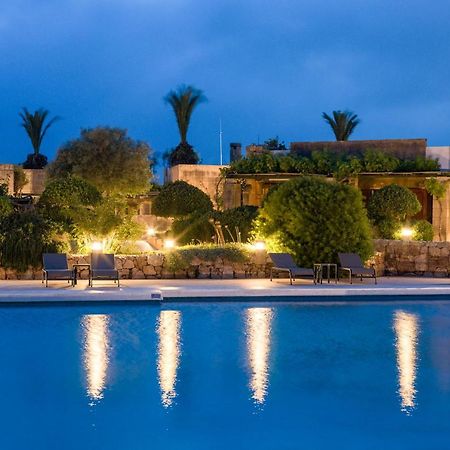 Hotel Ta' Cenc & Spa Sannat Exterior photo The resort at night