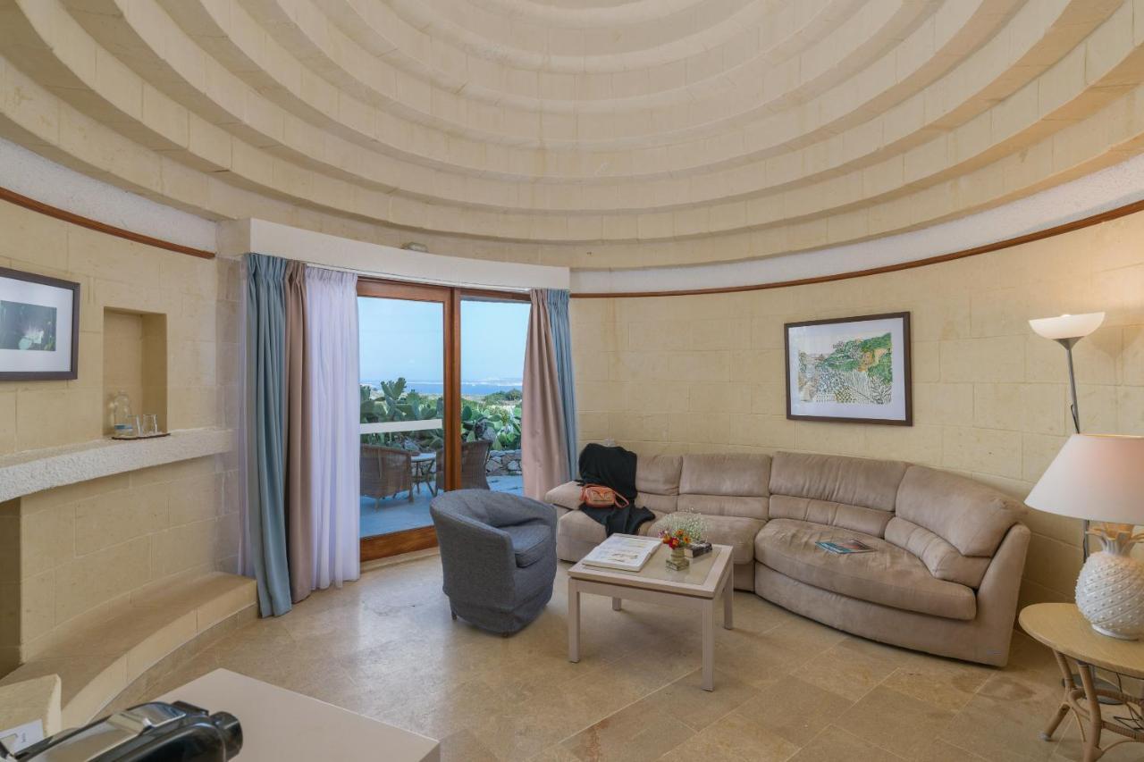 Hotel Ta' Cenc & Spa Sannat Exterior photo A suite at the Atlantis Paradise Island